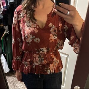 Maurice’s burnt orange floral blouse